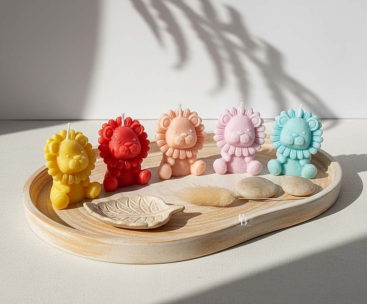 Cute lion candles lined up on a wooden tray, handmade soy wax, Pink Blossom bulk order