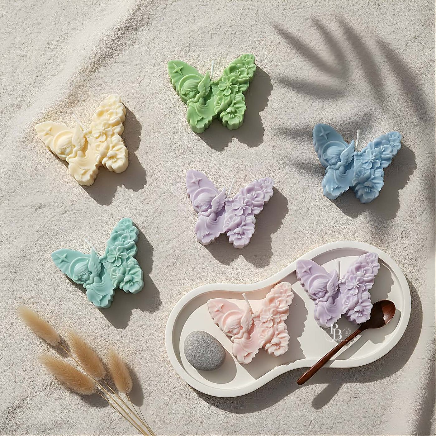 Pastel floral butterfly candles scattered on linen with tray, handmade soy wax, Pink Blossom bulk order