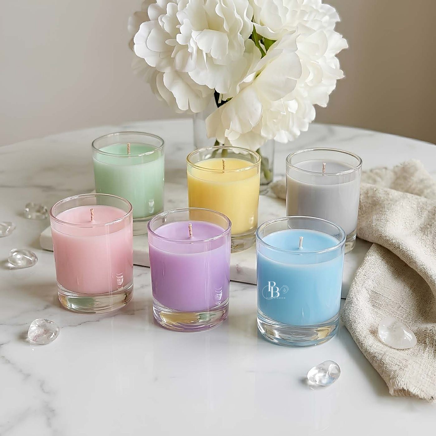 Six pastel votive glass candles on a marble table, 50ml Glass, handmade soy wax, Pink Blossom bulk order