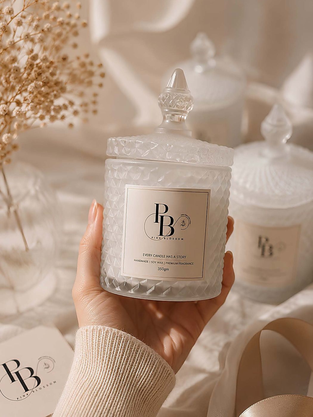 Hand holding a textured crystal glass jar candle with lid, 350ml, handmade soy wax, Pink Blossom bulk order